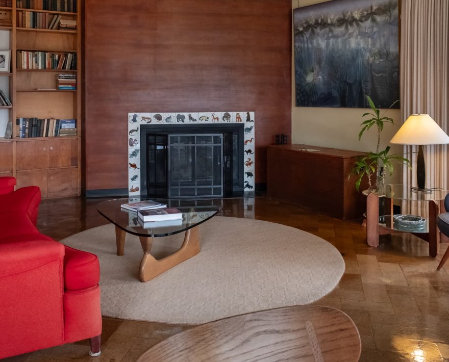 Common area living room with fireplace tiles by artist Carol Janeway