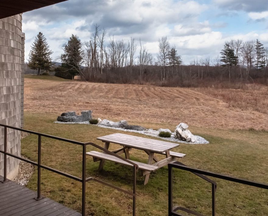 Picnic table searing in front of The Folly