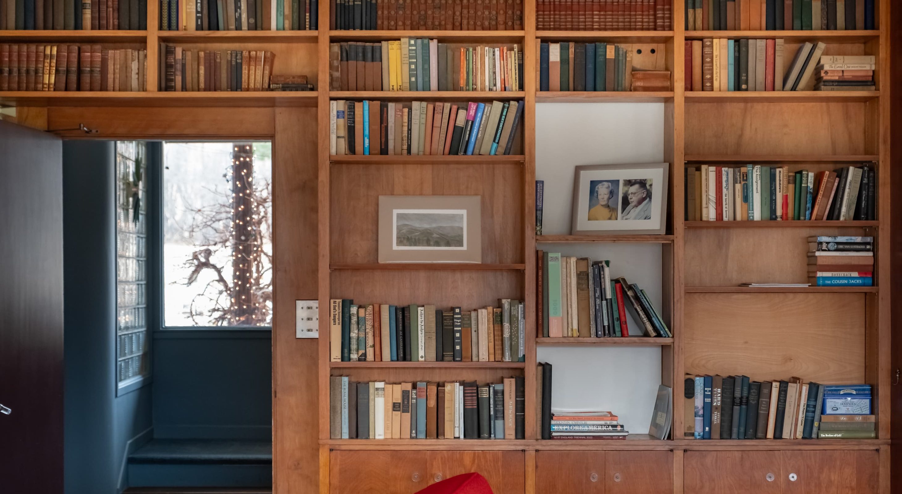 Floor-to-ceiling book shelf in the living area common space at our B&B in Williamstown, MA