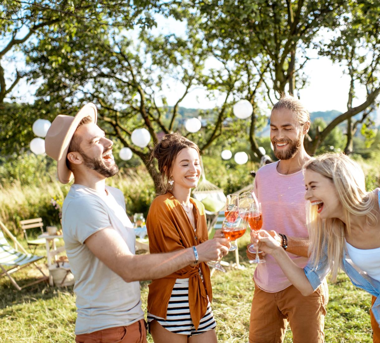 Friends toasting and smiling