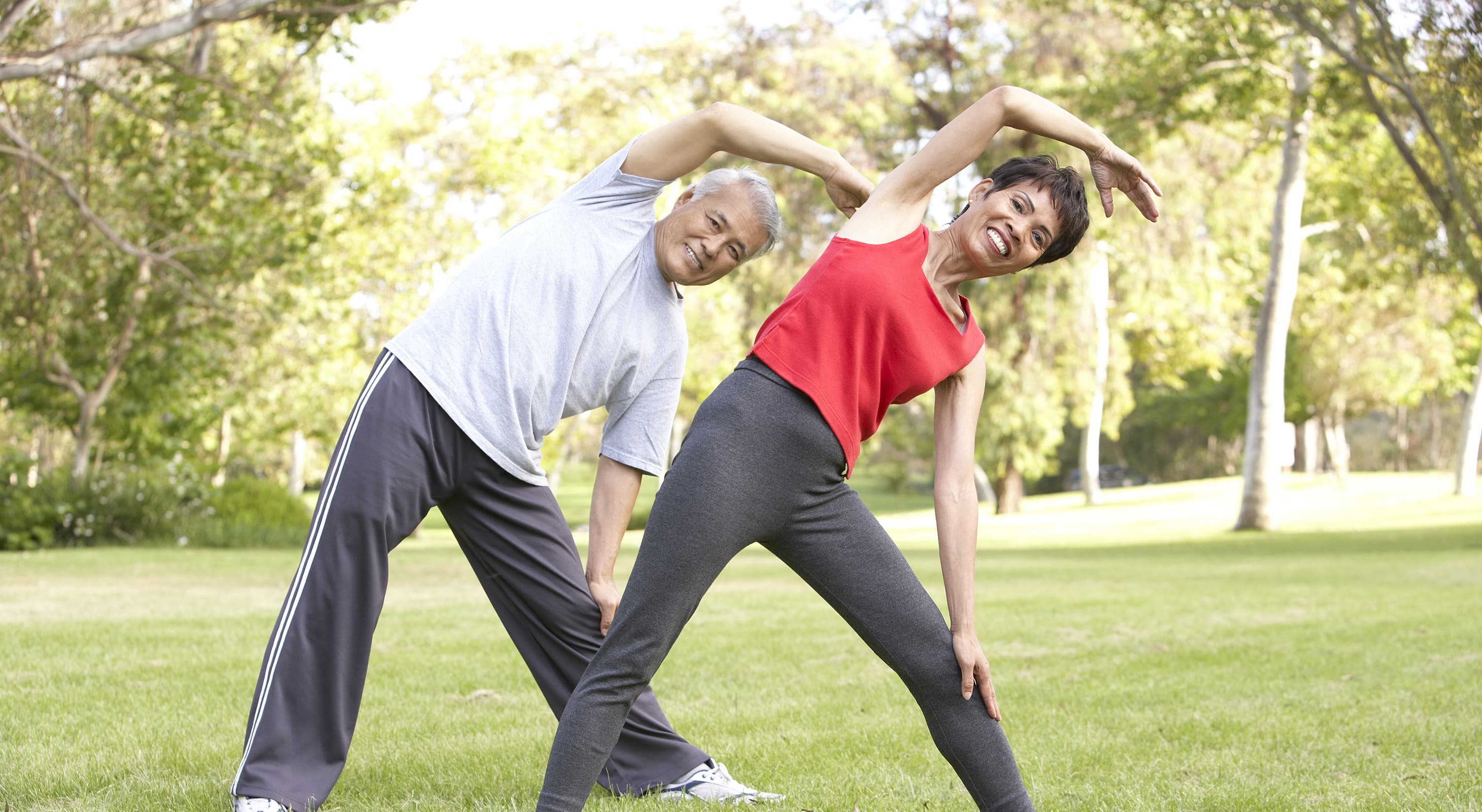 Couple enjoying yoga class in the sculpture garden during a erkshires getaway